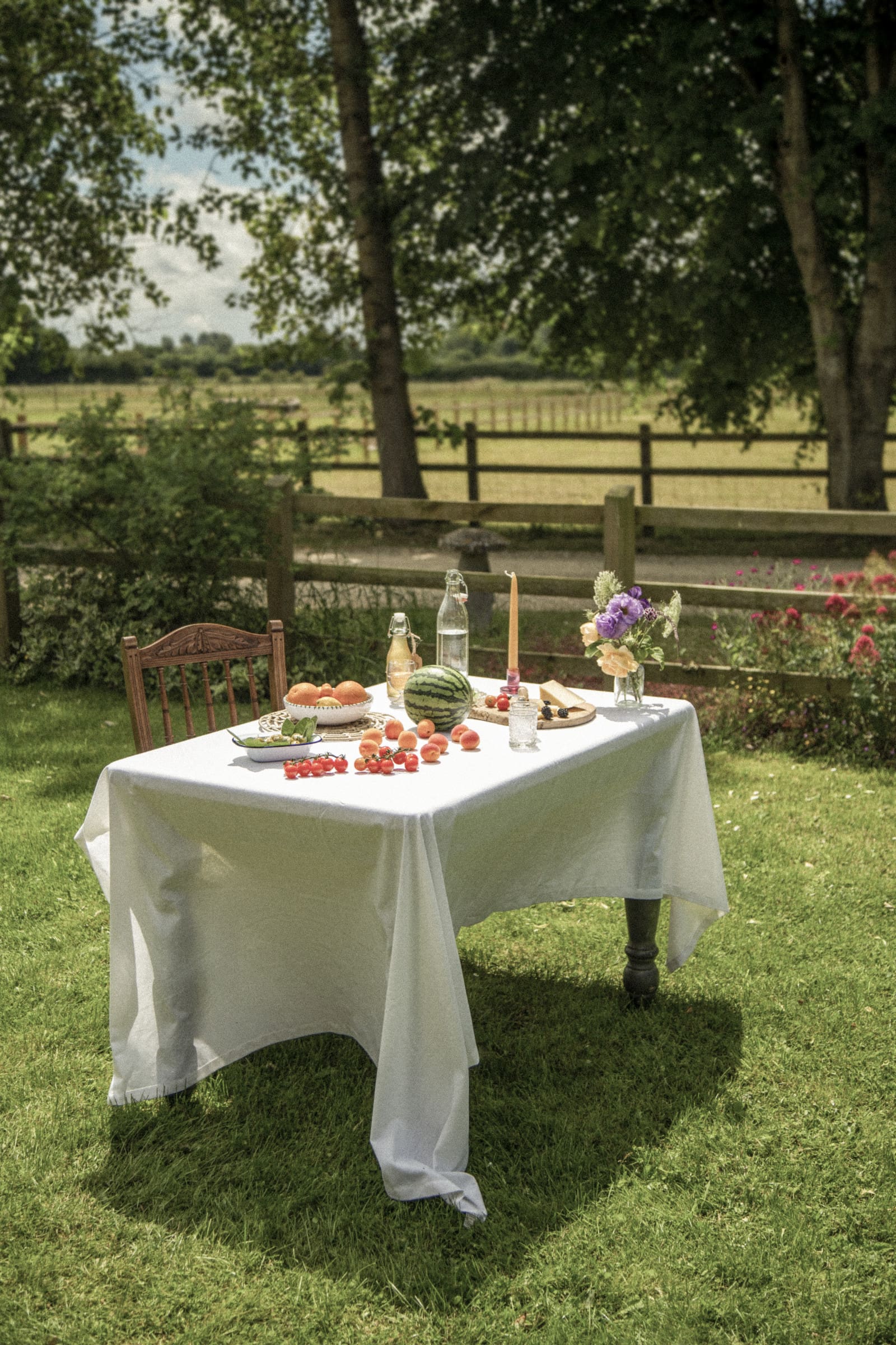 Outdoor table after a party with leftover food, like a viral post that brought views but no clients