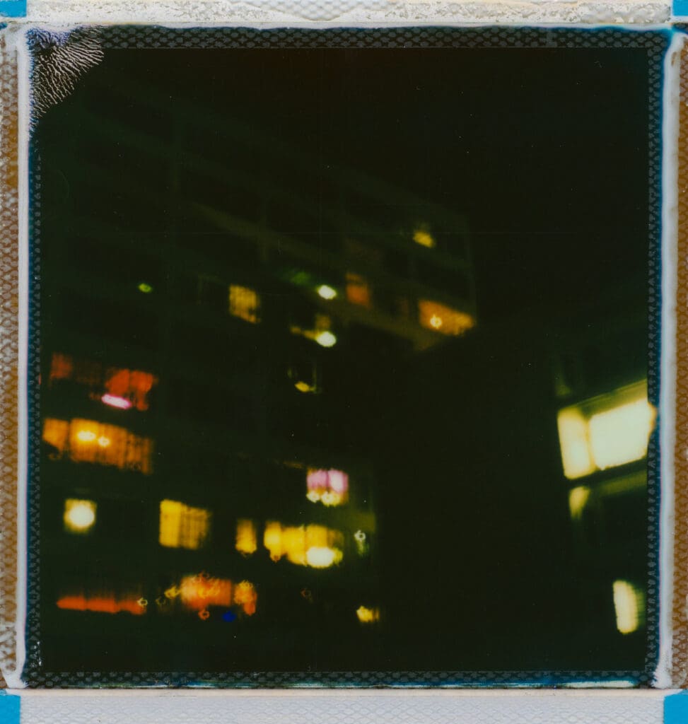 City windows lit up at night, when content ideas show up at the least convenient time