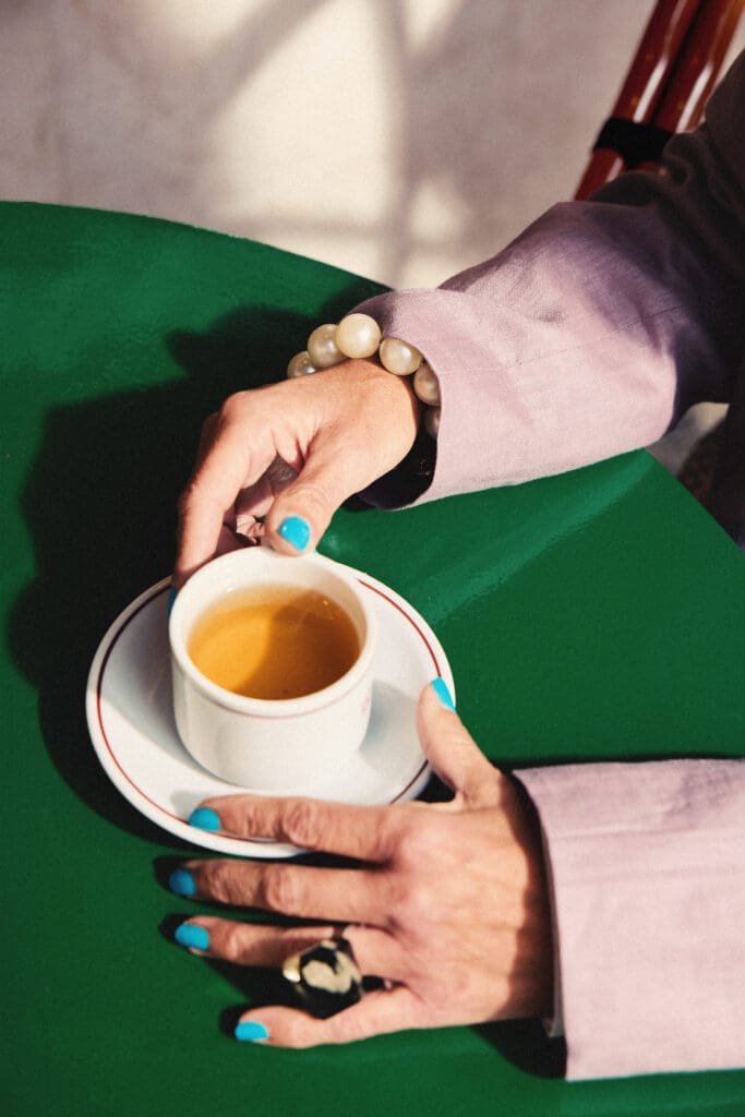 One person handing another a cup of tea, the way a good Instagram hook passes an idea on